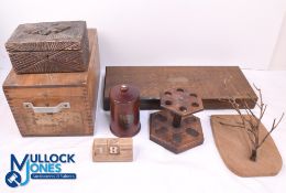 A small lot of seven wooden treen collectables including three storage boxes, a West African tobacco