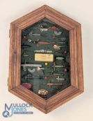 Hexagon framed display of artificial baits to include devons, spoons, shrimp mounts and phantoms,
