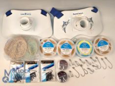 A collection of sea fishing equipment, as follows: 2x Sure catch fishing rod bait rest, one used and