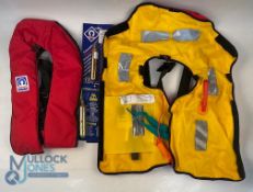 A pair of life preservers: Crewsaver buoyancy aid, looks unused, with instructions and spare bottle.