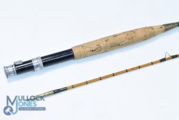An 8' 2 piece split cane trout fly rod, in fine condition, green close whipped, lined butt/tip