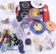 Large quantity of spinning accessories, including Rapala plugs, Abu and Mepps spinners, Devon