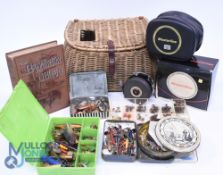 A collection of fishing items: Small wicket creel, leather strap and buckle. 18 section fly case
