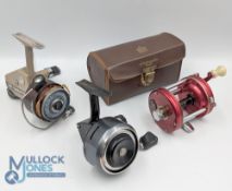 3x ABU reels - features an ABU Ambassadeur 6000 multiplier reel in red finish, counter balance