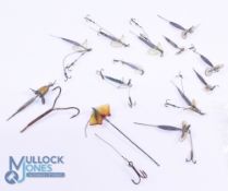 Collection of 14 assorted vintage leaded bait mounts in sizes 1