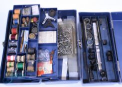 Two cantilever tool chests containing a rod repair/build kit, reel seats, ferrules, butt caps and