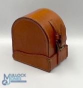 A fine unnamed large block leather 'D' reel case, burgundy lining, 4