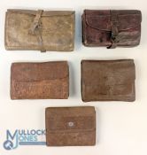 A collection of unnamed leather wallets: 7