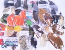 A box with over 60 capes, some dyed and some natural, all in good condition