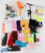 A small fly tying kit comprising: lever vice, bobbin holders, scissors, hooks, beads, thread and