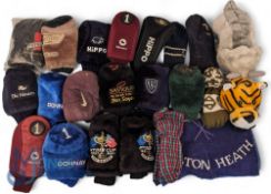 Quantity of assorted Golf Cub Covers, assorted clubs, drivers, and putters with noted examples of