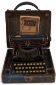 A Vintage Corona Typewriter c1910: flip out style typewriter in case, showing some signs of age