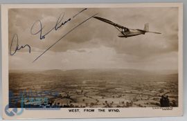 An original sepia Postcard Photograph signed in blue ink by Amy Johnson from the West Mynd, this was