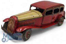 Mettoy Citroen Saloon Tinplate Car, red and cream upper body, grey Dunlop wheel, with working