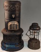 A Valor 525t Paraffin Heater/Stove, plus a hurricane brass lamp