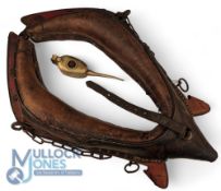 Antique leather Horse Driving Harness Collar Yoke, from a working horse, with a vintage oil can -