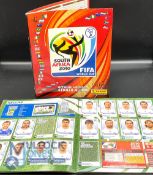 Panini Football Albums (empty) 2010 South Africa World Cup together with another example missing 141