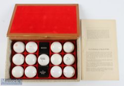 Set of 12 Replica Antique Golf Balls titled 