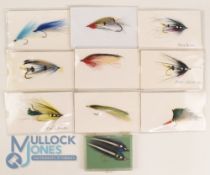 A collection of 9 carded salmon and saltwater flies for mounting and display, some named. Note -