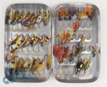 Unnamed alloy file tin with 84 medium clips with 10 gut eye salmon flies, and 28 single and double