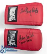 Sir Henry Cooper and John Conteh 1st Oct 1974 signed red Lonsdale boxing gloves. Good condition.