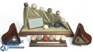 Golf Ball Book Ends. Featuring McEwan Club with a Gutta Ball and Philip Club with a Feathery Ball,