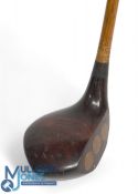 James Sherlock weighted training club in the shape of a brown stained socket neck wood stamped R H