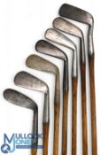 7x Assorted Tom Stewart irons features an R Walker mashie niblick, 2x mashies, a no 3 iron, a mid