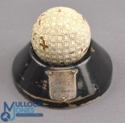 1920 Oxford v Cambridge golfing trophy - comprising a mesh pattern golf ball on a black circular