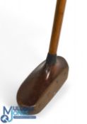 Unusual centre shafted wooden slim mallet head putter with integral brass sole and full face