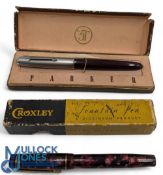 Parker 51 Fountain Pen, stainless steel cap with a red body, in its original box in good used