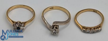 18ct Gold & Diamond Rings 3 in total marked 18ct with diamonds, one having a sapphire (3) (9g)