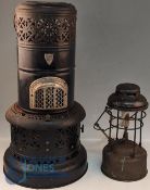 A Valor 525t Paraffin Heater/Stove, plus a hurricane brass lamp