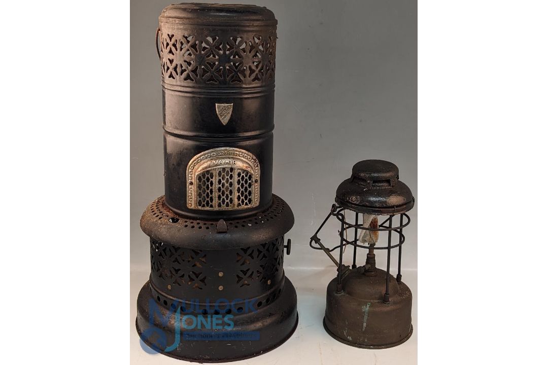 A Valor 525t Paraffin Heater/Stove, plus a hurricane brass lamp