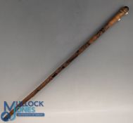 An Oriental Bamboo Walking Stick, carved male and female figures, 87cm long with brass ferule