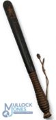 A black painted Victorian Police Truncheon with VR Crown Insignia and unpainted ribbed grip