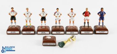 8x Yesteryear Miniatures: Women Football World Cup Figures, 8 hand painted metal figures of wooden