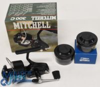 A fine Mitchell 300C fixed spool reel with 2 cased spare spools, very good bail on/off check. In