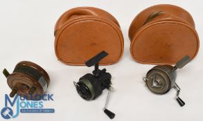A collection of reels, as follows: Triplex-C, made in Germany, fixed spool LHW reel with half