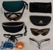 A collection of protective glasses, as follows: Adidas Polarised sun glasses with hard clamshell