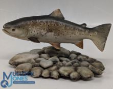 A Pottery Salmon Sculpture on a naturalistic pebble base signed and dated N Dalrymple 1981, 16cm x