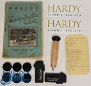 A collection of Hardy accessories, made up of: 1951 Hardy Angler's Guide. 2x Hardy Turbo windproof