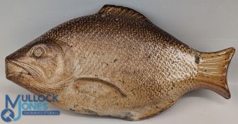 A Brampton salt-glazed stoneware spirit flask, c1840-50 realistically modelled as a fish, 27cm