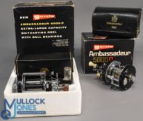 ABU Garcia Ambassadeur multiplying reels (2) features a 6000C model foot stamped 087200, c/w oil,