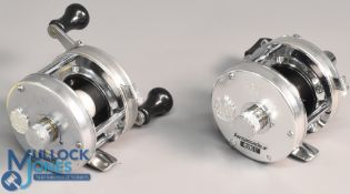 2x ABU Ambassadeur 4500C multiplier reels in silver finish, feet stamped 770300 and 770600 - 1x with