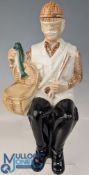 1969 Ballantines Liqueur Bottle, shaped as a seated fisherman with his catch, empty bottle 35cm