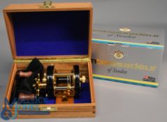 Fine ABU Ambassadeur 5500C De Luxe multiplier reel with polished wood handle, foot stamped
