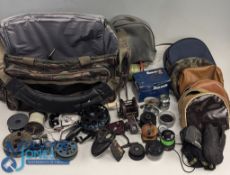 Graveyard of Fishing Reels, a padded insulated fishing tackle bag with assorted reel parts, all have