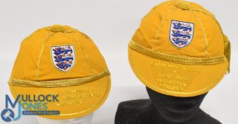 2x Replica England Football Caps: a Bobby Charlton v Northern Ireland 1970, and a Billy Wright v