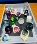 A collection of seventeen mainly Caithness paperweights including pink Dahlia limited edition 1/
